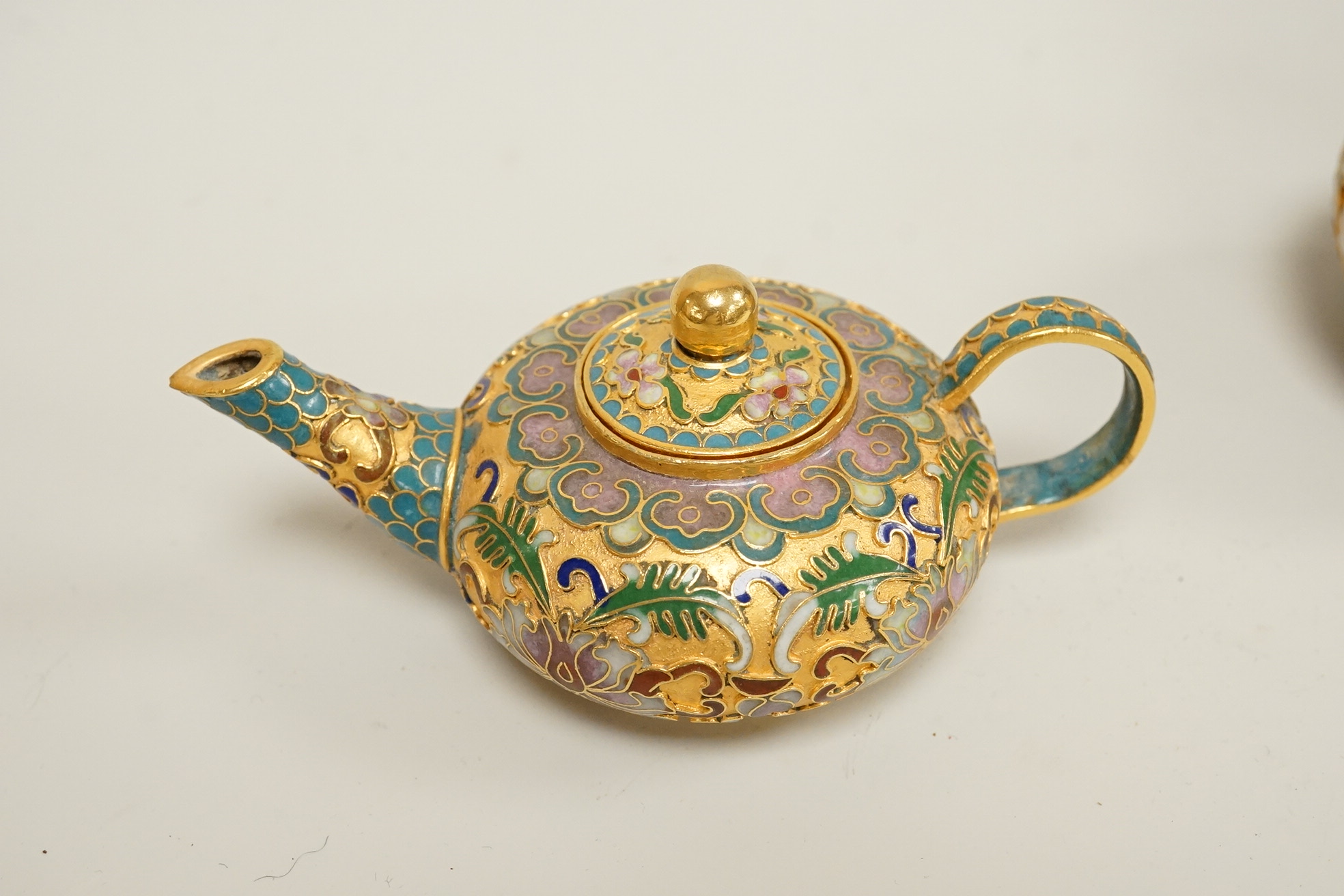 A collection of miniature enamel and cloisonné boxes, eggs and a painted rabbit, etc. (11)
